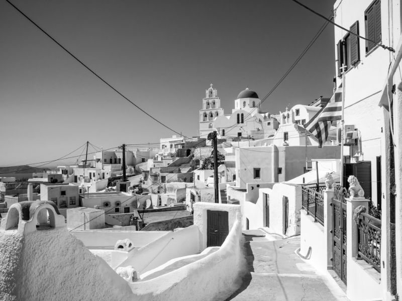 History of Santorini a black and white photo of Santorini Greece